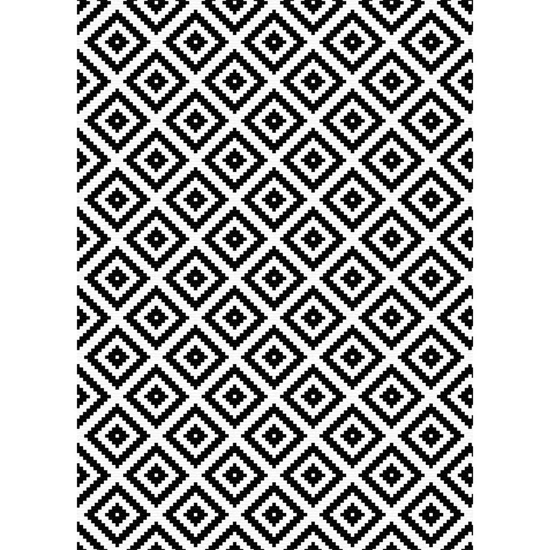 Weicher und glänzender geometrischer Teppich Dina in Schwarz und Weiß